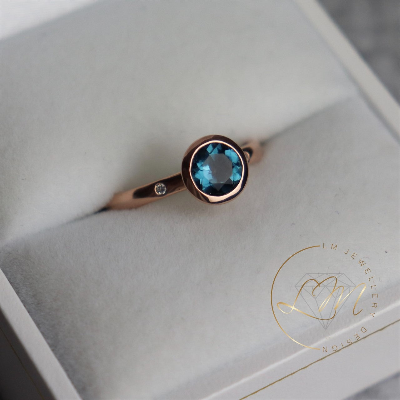 9ct Rose Gold London Blue Topaz & Diamond Ring