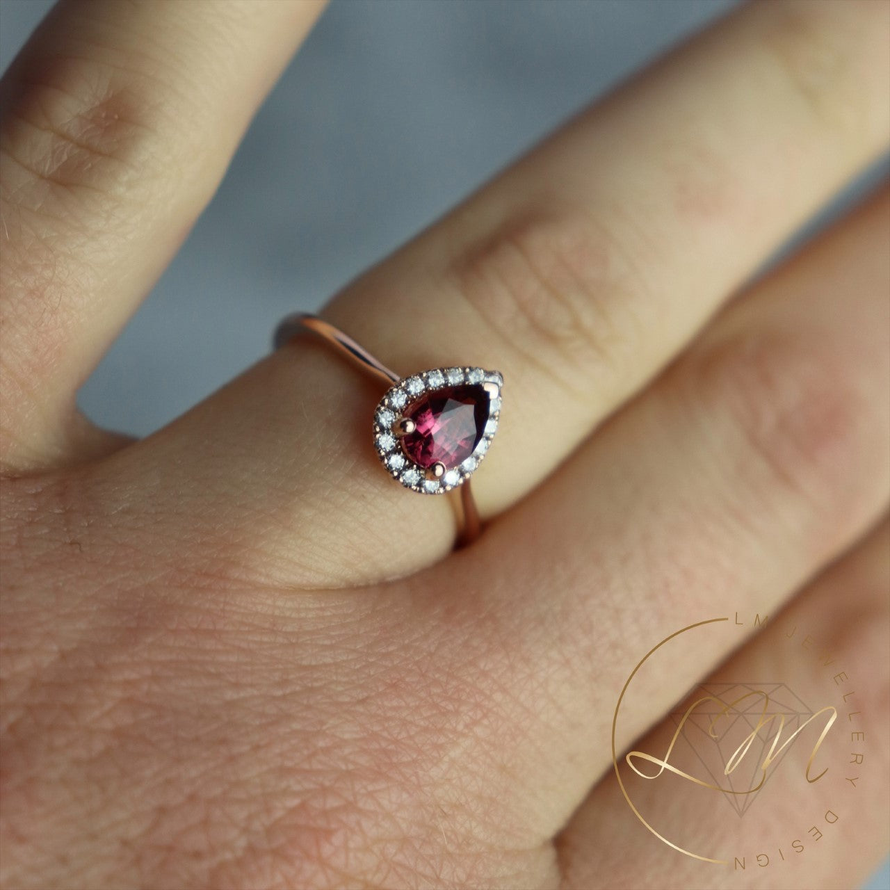 14ct Rose Gold Pear Spinel & Diamond Halo Ring